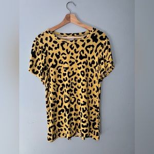Lularoe cheetah print soft ruffled shirt.